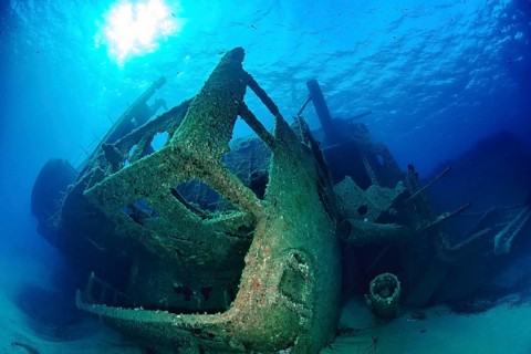 Broken wreck from 1972 sunken sunken ship freighter rusting shipwreck Elviscot lies on starboard
