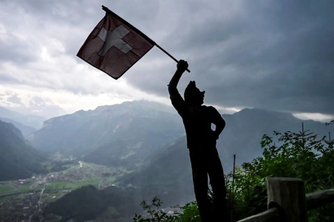 Sculpture flag-waver Harder Kulm viewpoint, Interlaken, Switzerland, Europe