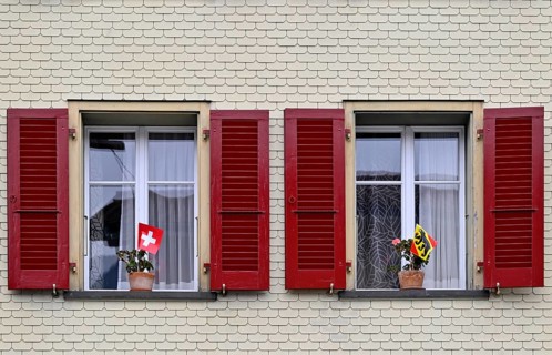 Window with Swiss and Bernese flags