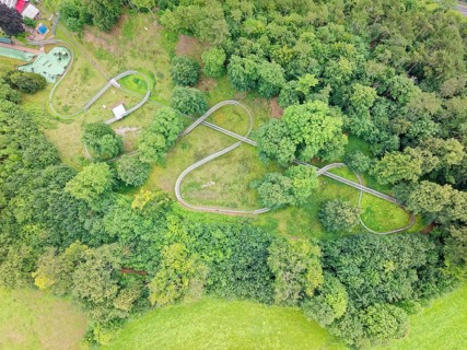 Aerial view of the Bodenwerder toboggan run, a summer toboggan run in the Weserbergland region.