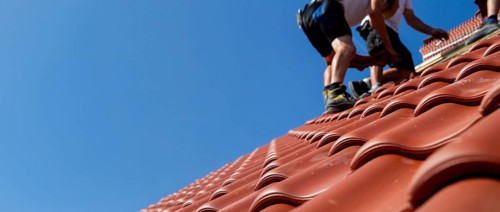 Panoramic image of the roof covering of a new tiled roof on a residential building
