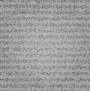Gray concrete wall with rough, speckled texture and uneven pattern creates an industrial and rugged