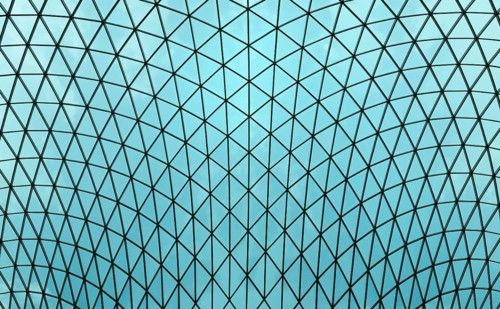Interior view of the glass lattice roof over the great court in The British Museum, London,