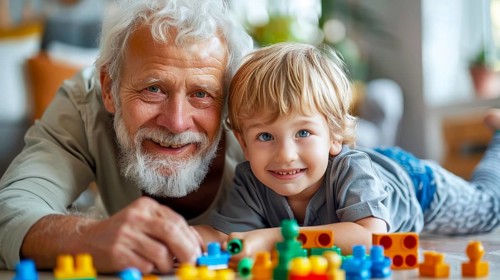 A grandfather and grandson joyfully playing with colorful building blocks indoors, AI generated