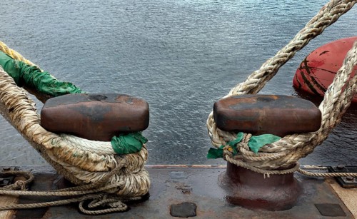 Hamburg, 19.06.2009, Ships are fastened with ropes to bollards in the harbour, Hamburg, Germany,