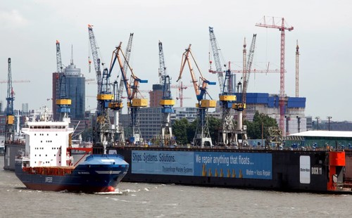 Hamburg, 19.06.2009, Ship passes the Blohm & Voss shipyard in Hamburg harbour, Hamburg, Germany,