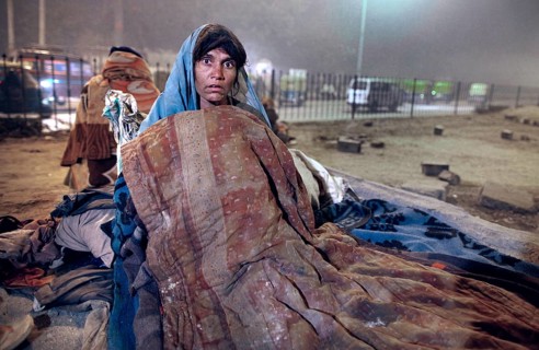 New Delhi, India, 21.01.2010, Homeless woman. Sleeping place under a bridge, India, Asia