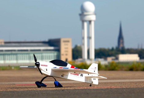 Berlin, 12.10.09 2010, A model aeroplane stands on the runway of the former Tempelhof Airport, now