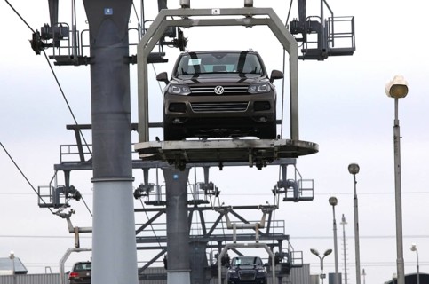 Bratislava, 05.10.2010, VW Touareg sport-utility vehicles are carried by a lift from an assembly