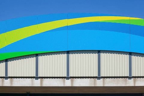Colourfully painted motorway bridge with noise barrier over the river Este, Buxtehude, Altes Land,