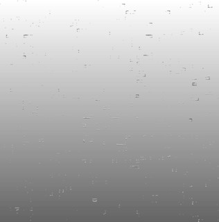 Raindrops trickling down a window on a grey, overcast day creating a calm and serene atmosphere