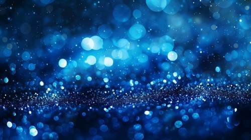 Ethereal abstract image with varying blue bokeh lights creating a mysterious and deep atmosphere,