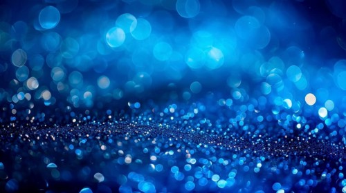 Vivid abstract image featuring a sea of blue bokeh lights creating a dynamic and vibrant