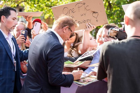 Kevin Costner signs autographs at the premiere of Horizon at Berlin's Zoo Palast on 04/08/2024