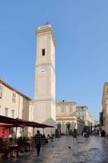 Clock tower Tour de l'Horloge with street bar, Tower with clock, Place de l'Horloge, Nîmes, Gard,
