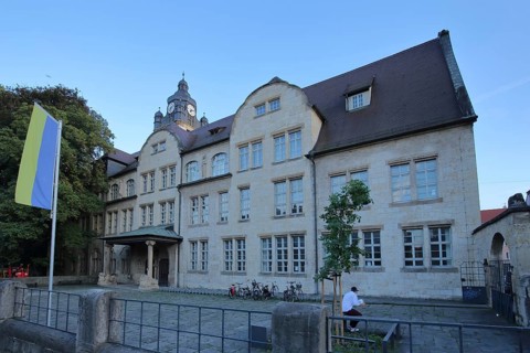 University with Ukrainian national flag, building, Jena, Thuringia, Germany, Europe