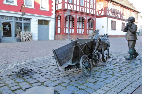 Sculpture goat cart with boy and broken cart, wheel, cart wheel, cart, cart, wagon, broken down,