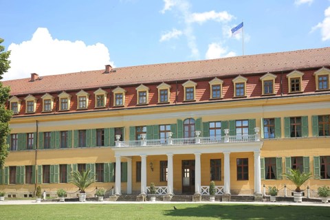 Classicist castle with arcade and shutters, yellow, green, Sondershausen, Thuringia, Germany,