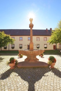 Fountain in the inner courtyard with backlight, Church of the Assumption of the Virgin Mary, St.