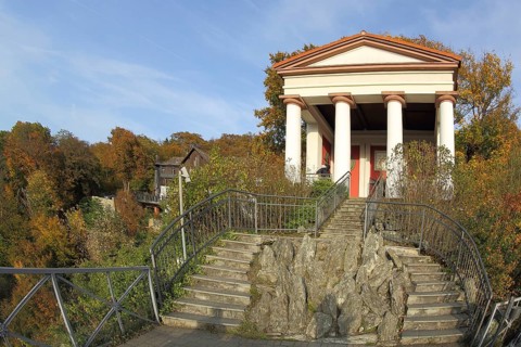 Classicist imperial temple with columns and staircase with rocks in autumn, landscape, mountain,