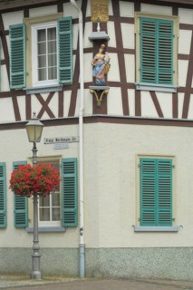 Graf Müller winery, street lamp with floral decoration, half-timbered house, Bischof-Blum-Platz,