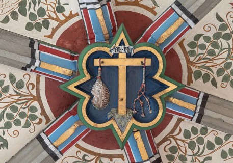 Cross of Jesus with the instruments of the scourge, keystone in the vault of the Cathedral of the