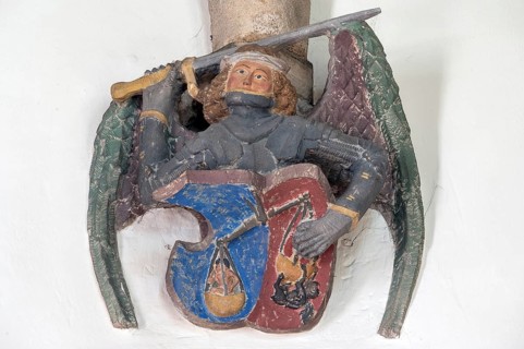 Archangel Michael with soul scales and sword, console stone in St Martin's Church, Plieningen,