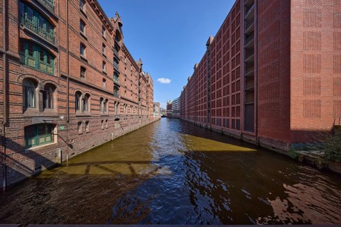 Brooksfleet with historic brick warehouses and the Conti multi-storey car park, Free and Hanseatic