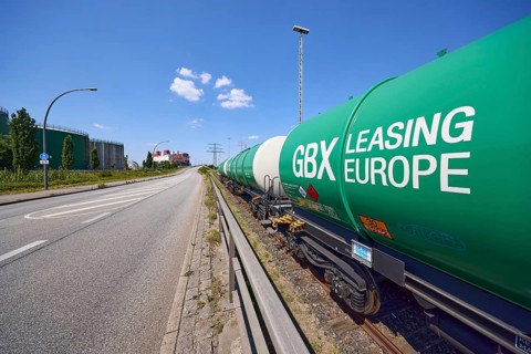 Road with railway tracks and tank wagons from GBX Leasing Europe in the Port of Hamburg, Free and