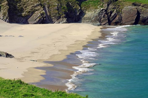 Calm sandy beach with shallow water and small waves, Blasket Islands, Dunmore Head, Ireland, Europe