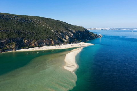 Figueirinha White Beach and Sandspit, Mountain and Atlantic Ocean. Portugal. Aerial View