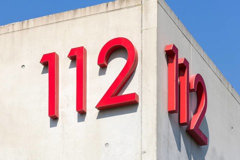 Symbolic image, emergency number 112 on a building, facade, emergency call, emergency, police, fire