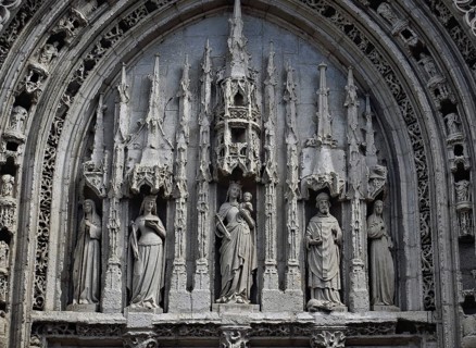 Tympanum at the Sainte Radegonde church (Poitiers, France) . Sainte Radegonde is 2th from left,