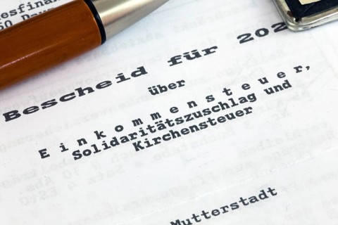 Symbolic image of income tax: close-up of an income tax assessment notice