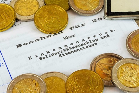 Symbolic image of income tax: close-up of an income tax assessment notice