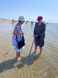 Two old woman bathing with their feet in the sea Borkum, 20.07.2024