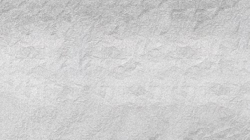 A textured surface resembling crumpled paper in shades of white and gray