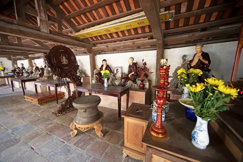 Buddha figures in the Buddhist Thay Temple or Chua Thay or Master Temple, Sai Son Village, Hanoi