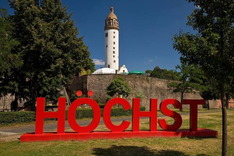 Red Höchst lettering in front of Höchster Schloss or Altes Schloss Höchst, Frankfurt-Höchst,