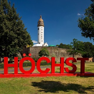 Red Höchst lettering in front of Höchster Schloss or Altes Schloss Höchst, Frankfurt-Höchst,