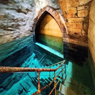 According to the inscription, the historic mikvah was built in 1260, the shaft is 25 metres deep