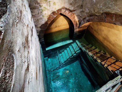 According to the inscription, the historic mikvah was built in 1260, the shaft is 25 metres deep