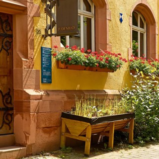 Jewish bath, historic mikvah, facade decorated with flowers, Judengasse, Jewish quarter, old town,