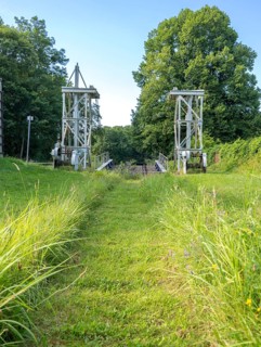 Landing stage of the historic railway ferry with overgrown old rails on the banks of the Havel in