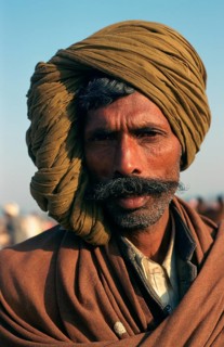 Portrait of a farmer (Rajasthan, India) . The turban indicates the caste, the region of the man who