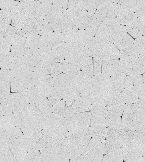 Abstract stone texture resembling a gray mosaic with rough surface and irregular geometric patterns