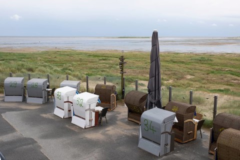 Beach chairs on the promenade near Wittdün, landscape at the Kniephaken, North Sea coast, Amrum,