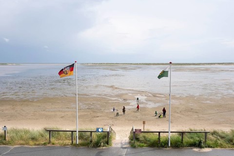 People in the mudflats at low tide, Kniephaken, Wittdün, North Sea coast, Amrum, North Sea island,