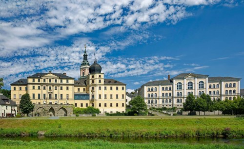 Classical Lower Castle and G. E. Lessing State School on the River Weisse Elster, residential town