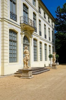 Main portal with two hunter figures, summer palace and park, residential town of Greiz, Thuringia,